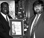 SAMA president, Dr Amadi-Echendu (left) with Gold Sponsor Rockwell Automation's commercial marketing manager, Abraham Brooks